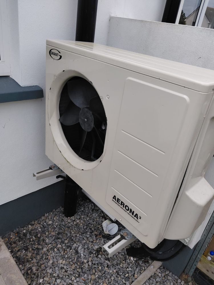 Completed air-to-water heat pump installation at a domestic property